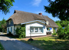 Aussenansicht des alten Reetdachhauses